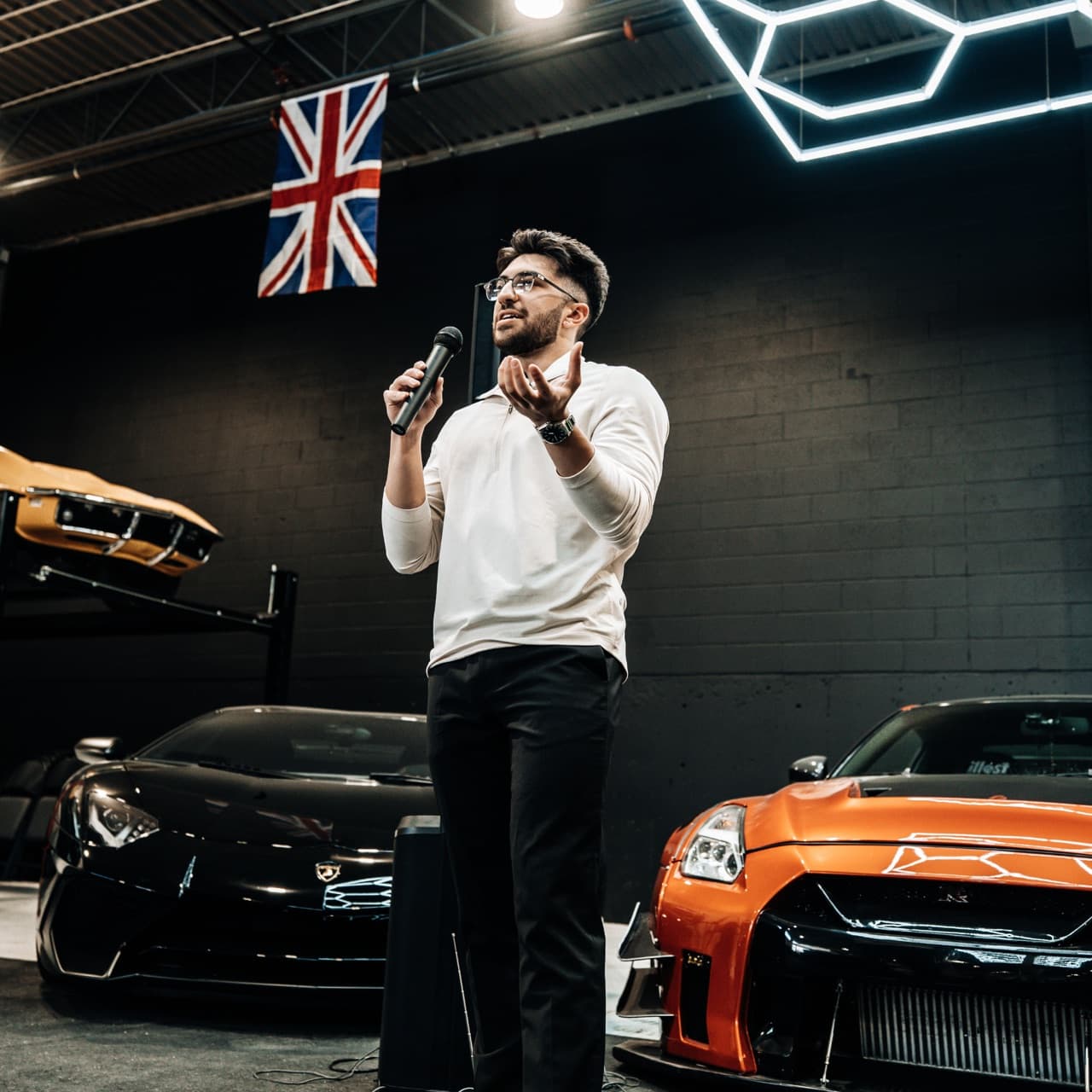 Dario, Founder of Bayline Growth, speaking at an automotive event